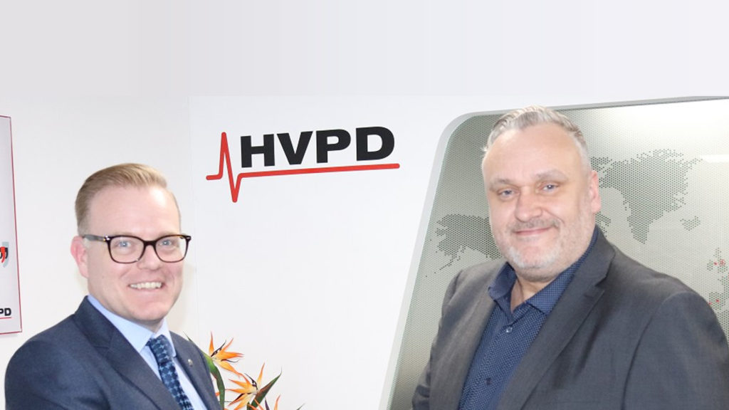 two cooperating managers beside a logo of HVPD